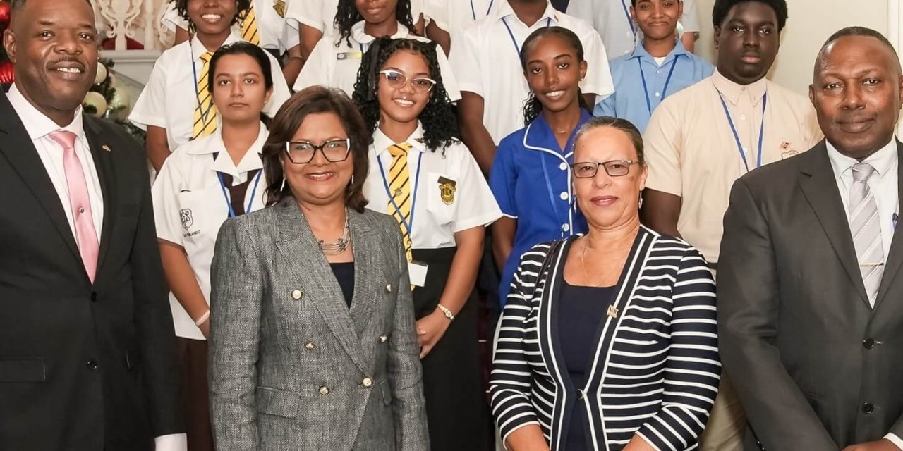 Her Excellency receives CXC Top Regional Awardees