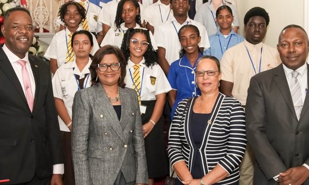 Her Excellency receives CXC Top Regional Awardees